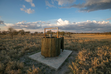 A simple bush toilet and shower at the Baines Baobab campsite in Botswana