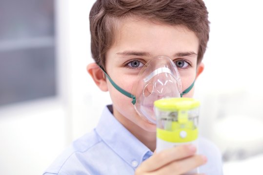 Boy using nebuliser
