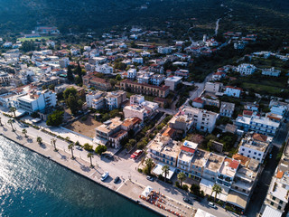 Obraz premium Aerial view of the roofs houses on Methana harbor, Greece.