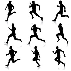 Set of silhouettes. Runners on sprint, men