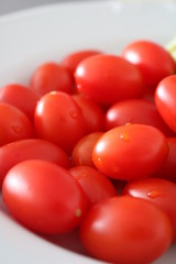 tomatoes on black background