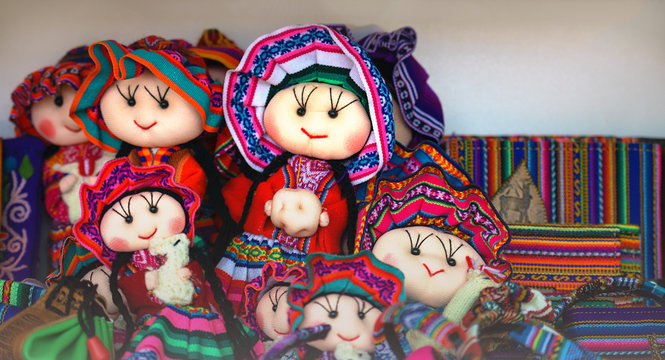 Peruvian dolls sale in souvenir shop of Cusco, Peru. Handmade. Close up souvenirs of Peru, in a traditional market. Selective focus