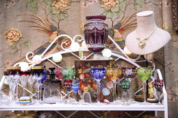 Rack with vintage crystal wine glasses at the flea market