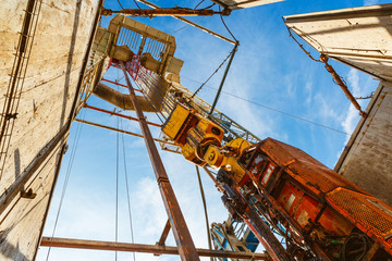 Drilling rig in oil field for drilled into subsurface in order to produced crude, inside view....