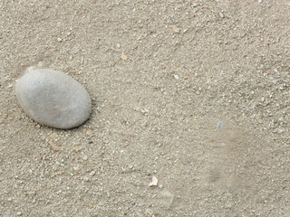 Fototapeta na wymiar roca en arena