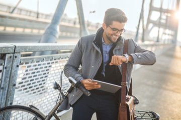 Fototapeta premium Young business man going to work.