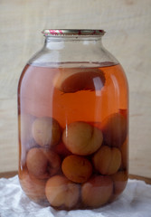 Bank of canned fruit compote on the shelf