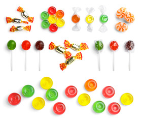 Set with different candies on white background, top view