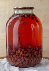 Bank of canned fruit compote on the shelf