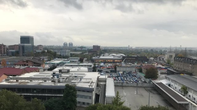 Cinemagraph - Urban view to industrial area of the city. Car parking in Turin. Barriera, Torino.