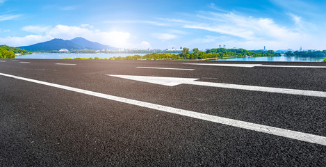 Empty asphalt road square and natural landscape under the blue sky