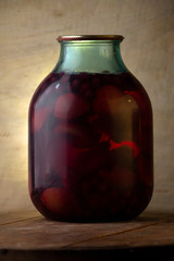 Bank of canned fruit compote on the shelf