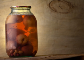 Bank of canned fruit compote on the shelf