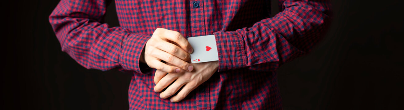 man hold ace in sleeve and do tricks with cards b