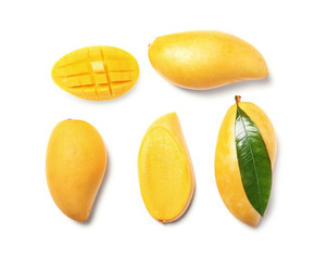 Composition with fresh mango fruits on white background, top view