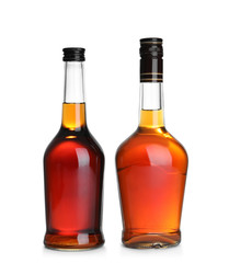 Bottles of scotch whiskey on white background