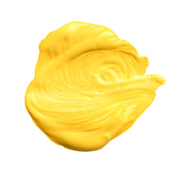 Abstract brushstroke of yellow paint isolated on white