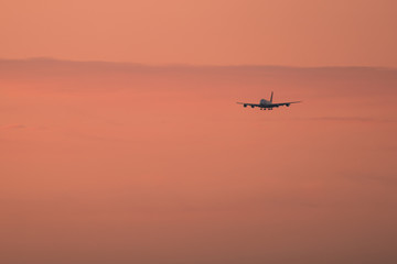 aircraft landing at sunrise