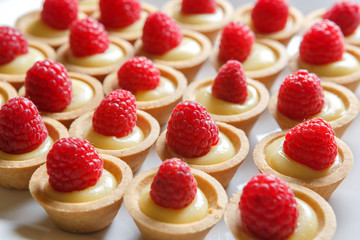 Raspberry cupcake desserts with cream