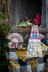 Balinese Hindu Offerings in Temple Shrine. Handmade temple offerings are generally made twice daily, in the morning and late afternoon, by every Hindu household and business. 