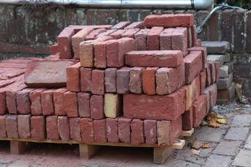 Pile of new red bricks