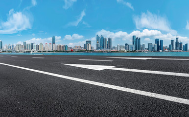 Empty asphalt road along modern commercial buildings in China,s cities