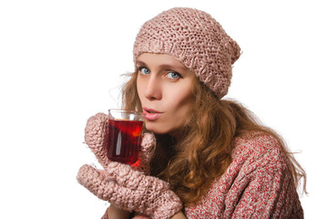 Young woman in sweater and wool cap