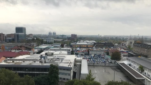 Cinemagraph - Urban view to industrial area of the city. Car parking in Turin. Barriera, Torino.