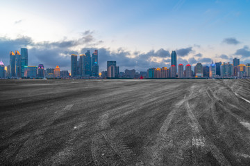 Empty asphalt road along modern commercial buildings in China,s cities