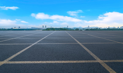 Empty asphalt road square and natural landscape under the blue sky
