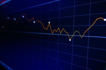 Stock exchange market graph on LED screen for business concept.