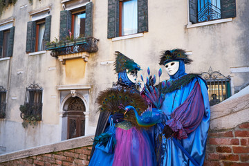 Fototapeta na wymiar Venice, Italy. People in masks and costumes at the Venice Carnival