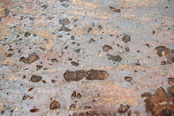 close-up of a deteriorated iron table