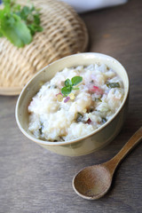 japanese rice congee with herbs and green vegetables