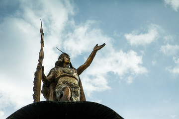 Fototapeta premium Inca golden statue in Cusco Main square