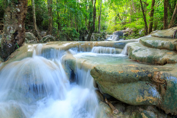 Naklejka premium Waterfalls In Deep Forest at Erawan Waterfall in National Park Kanchanaburi Thailand