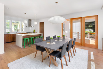 Bright Open Concept Dining Room and Kitchen in New Luxury Home