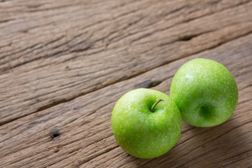 Fresh Green Apple on Wood