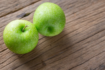 Fresh Green Apple on Wood