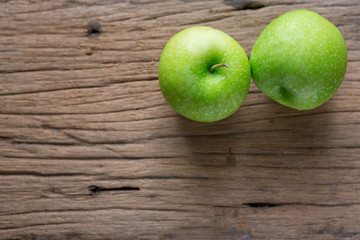 Fresh Green Apple on Wood