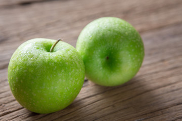 Fresh Green Apple on Wood