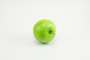Green apples on white background
