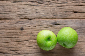 Fresh Green Apple on Wood