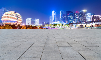 Urban skyscrapers with empty square floor tiles