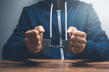 man hand handcuffs