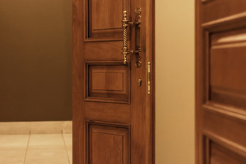 Obraz na płótnie Canvas Room with opened door. Wooden big door in theater or the hall