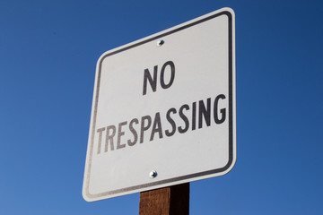 The "No Trespassing" sign in the California sun.