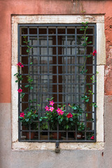Fototapeta na wymiar Window decorated with flowers