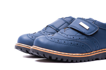 Blue baby shoes isolated on white background