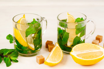 Two Cups of Mint tea on white background.